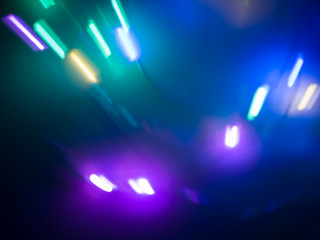 Colorful, blurred, motion, striking LED lights. Background for Christmas, New Year, Carnival, Independence Day, Easter and parties in general.