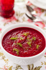 Cream of beetroot soup with fresh herbs