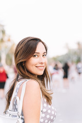 Portrait of pretty woman in the city