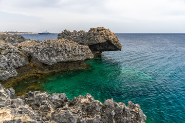 The rocky coast of the Mediterranean Sea on the island of Cyprus.