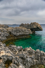 The rocky coast of the Mediterranean Sea on the island of Cyprus.