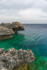 Fototapeta premium The rocky coast of the Mediterranean Sea on the island of Cyprus.