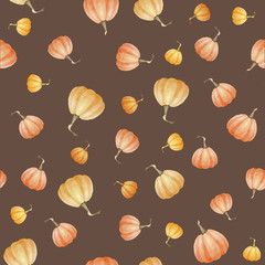 Seamless pattern with orange pumpkins on brown background.Watercolor vector