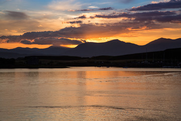 Orange Glow of Sunset in the Harbor of Oban, Scotland