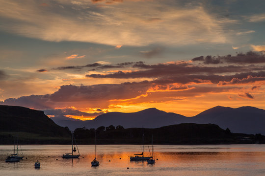 Orange Sunset Over the Harbor with Sail boats, Oban, Scotland