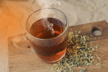 Black tea in a glass mug, hot drink