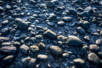 Stone and pebbles on beach