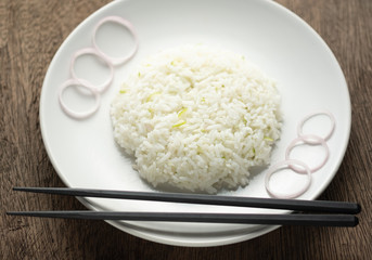 Cilantro lime in white dish,chopstick on plate