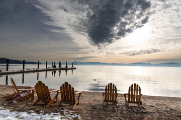 Winter sunset on beach in lake tahoe
