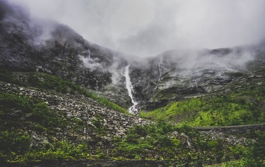 cloudy waterfall in the mountains