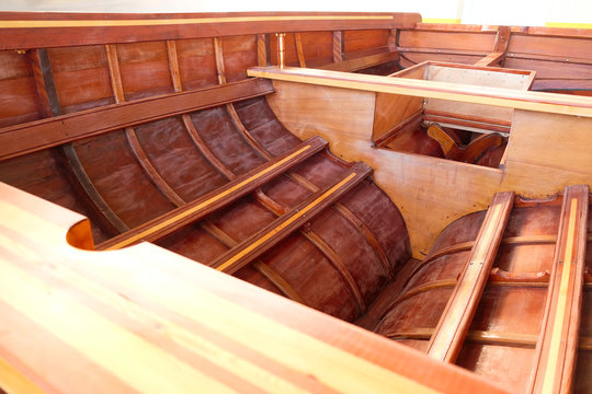 Small wooden boat construction details - bare interior view from bow quarter.