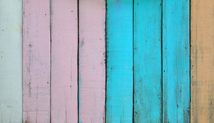 Old pastel painted wood wall texture background.