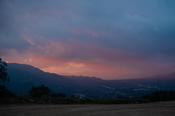 Obraz premium Soft pink and blue sunset over California mountains