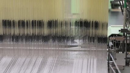 Weaving loom industrial textile production at work