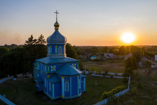 Old wooden church with metal roof. Located in a small village