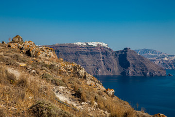 Fototapeta na wymiar The beautiful landscapes seen from the walking path number nine between the cities of Fira and Oia in Santorini Island