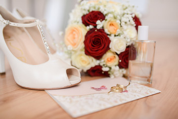 Heels for the bride and beautiful bouquet of flowers