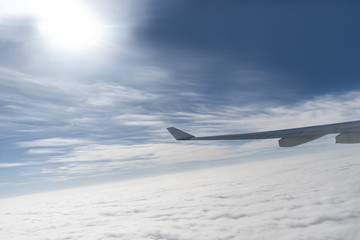 Fototapeta premium The airplane flew over the clouds. 