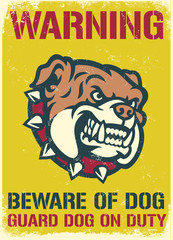 vintage and textured warning sign of beware of the dog