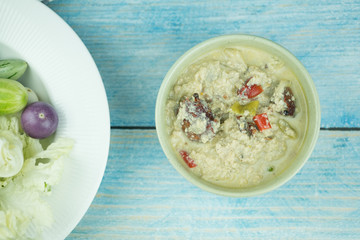 Tao Jiaw Lone (Herbed soya beans with minced pork in coconut milk)