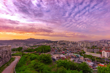 Fototapeta na wymiar Seoul City Skyline sunset Location at Naksan Park with Ancient Walls in Seoul South Korea