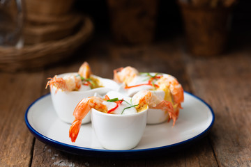 Steamed Seafood Curry Cakes with coconut cream and Prawn.