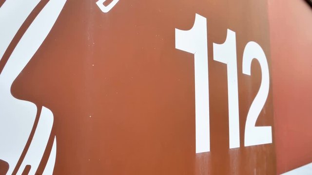 The number 112 on the side of the firetruck