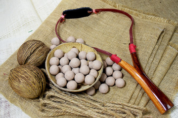 Catapult shaft and ammunition made from clay. Put on sackcloth