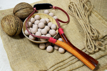 Catapult shaft and ammunition made from clay. Put on sackcloth
