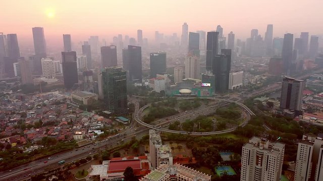 Aerial View of Jakarta City around Semanggi Interchange, showing extreme air pollution