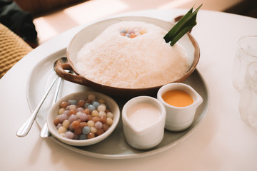 Thai desserts are on the table in the restaurant.