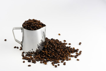 coffee beans in a jug isolate on white background.