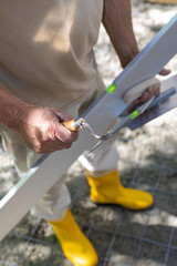 Worker with yellow boots