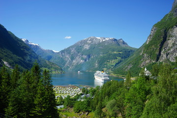 Fototapeta na wymiar Cruise ship at Geiranger fjord in Norway