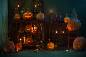 Halloween decoration with pumpkins and magic potions indoor