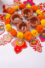 Indian Festival Diwali , Diwali lamp and flower rangoli 