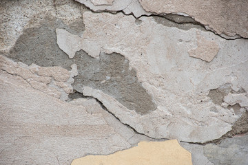 Cracks in the surface of the old wall