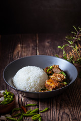 Thai food, Rice topped with stir fried basil and pork bone.