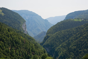 Obraz premium Scenic view to the mountain valley, summertime outdoor background