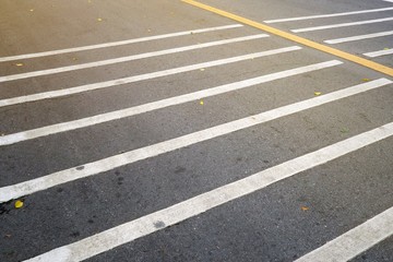 Asphalt road with white and yellow line background