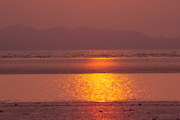 beach and sunset and gold ripples