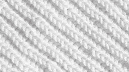 Knitted texture of gray and white color. Background for a festive winter postcard.