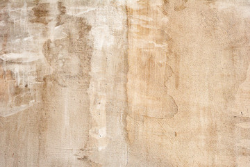 Texture of a concrete wall with cracks and scratches which can be used as a background