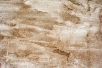 Texture of a concrete wall with cracks and scratches which can be used as a background