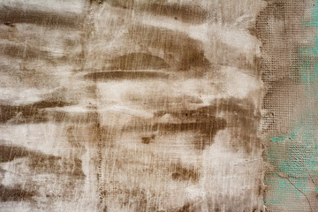 Texture of a concrete wall with cracks and scratches which can be used as a background