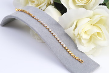 Gold and diamond heart shape bracelet.