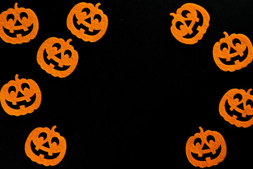 Halloween party. Scary orange pumpkin decoration isolated on bla