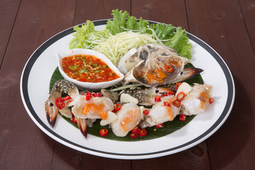 Fish sauce-fermented Horse crab on Plate. Fish sauce-fermented blue crab on Plate.  Thai Street Food.