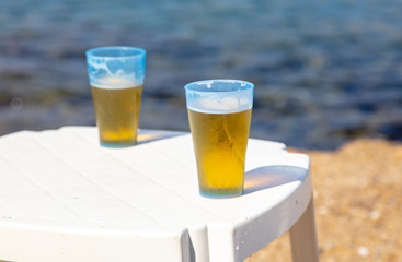 Two glasses of beer on the table