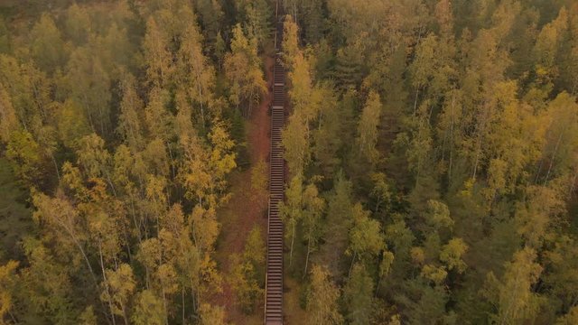 Aerial footage of drone flying away from hill.